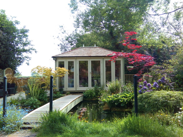 An 'Island Retreat' rather stunning Dukesbury Garden Room. Available from Taunton Sheds